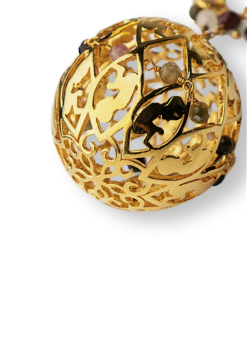 3-dimensional hand-cut, ball necklace with multi-coloured Tourmalines.