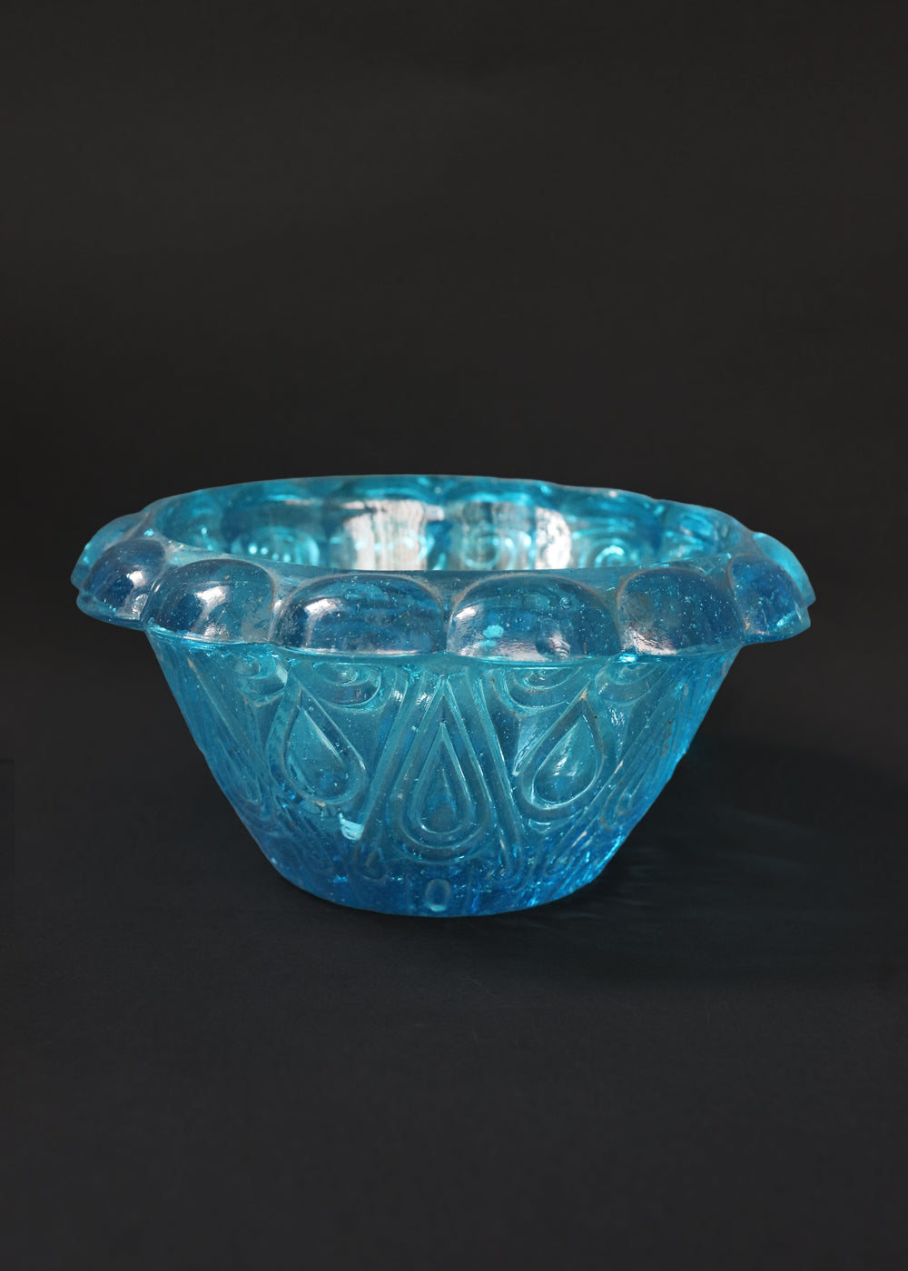 Antique moulded glass bowl in a beautiful turquoise colour and an incredible history
