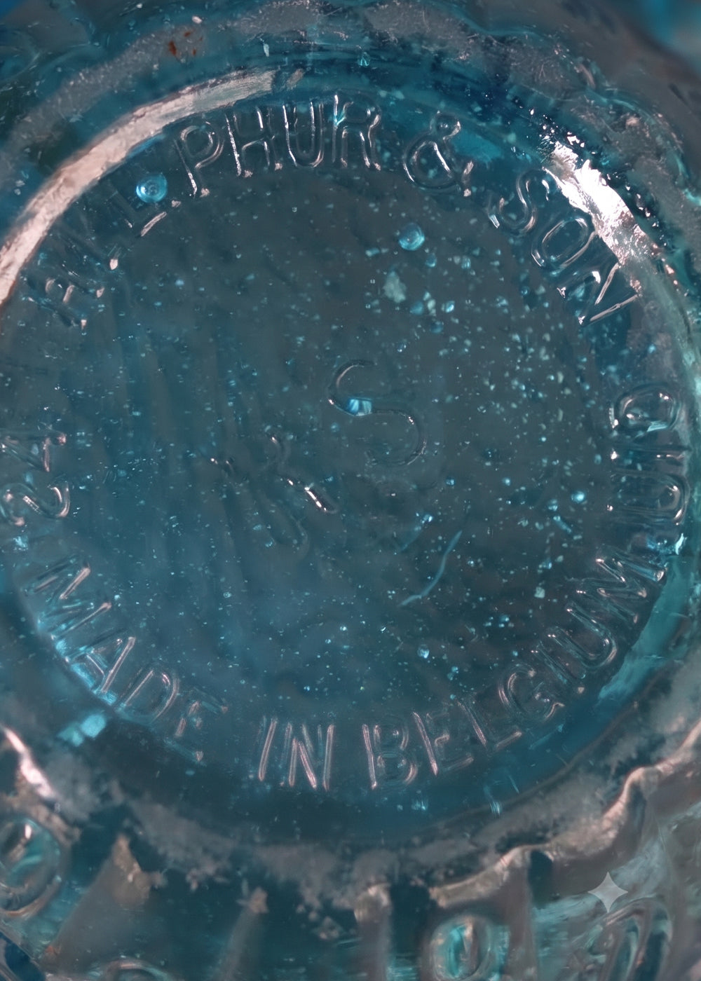 Antique moulded glass bowl in a beautiful turquoise colour and an incredible history