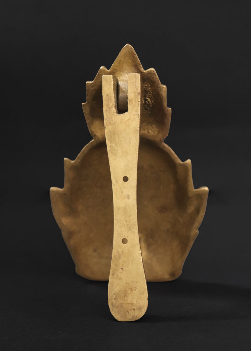 Vintage Newport brass door knocker. It is solid and heavy and was made by Virginia Metal crafters for their very popular Newport line. The pineapple knocker was especially beloved because the fruit is an enduring symbol of hospitality, wealth, and a safe return from sea voyages, a tradition with deep roots in Newport's maritime history. Made in the US, 1960s.