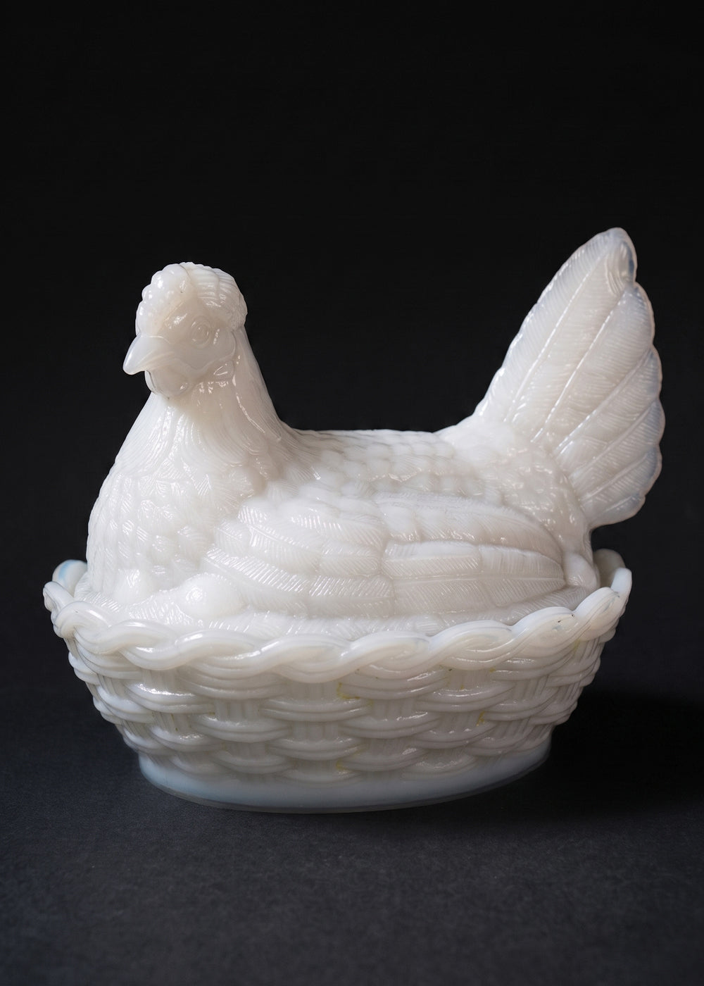 Antique opaline milk glass Hen on Nest covered dish. It was made by the prestigious French company Portieux Vallerysthal, and the company designed these between 1870 to 1920 so this piece is anywhere from 106 to 156 years old! The entire piece is very realistic with the feathers on the hen and the basket weave detail on nest, and the white colour is more rare than the others. Made in France.