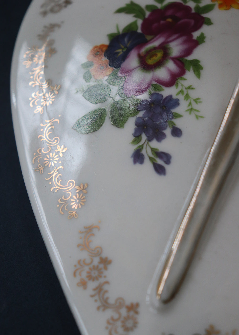 Vintage French Hors D'oeuvre set ornamented with beautiful floral bouquets and rimmed with gilted floral borders. These are by Hallimax, a French brand that distributed high-quality, romantic-style porcelain.