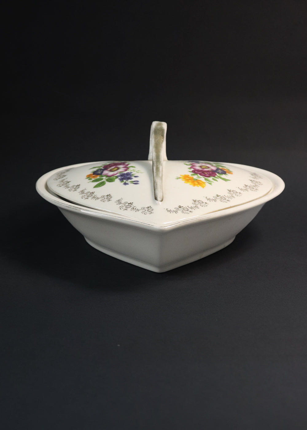 Vintage French Hors D'oeuvre set ornamented with beautiful floral bouquets and rimmed with gilted floral borders. These are by Hallimax, a French brand that distributed high-quality, romantic-style porcelain.
