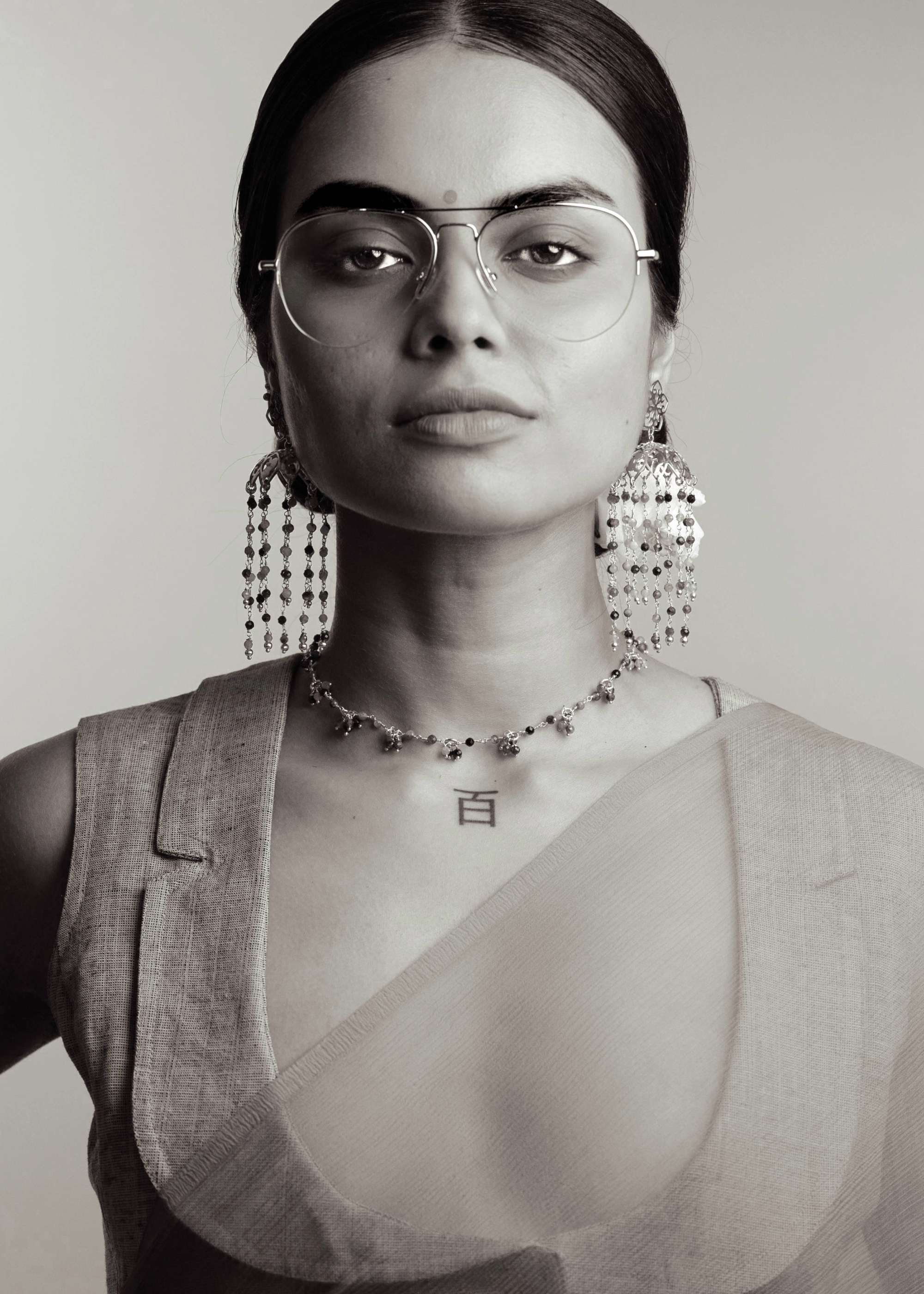 designer jhumka earrings by eina ahluwalia with multi coloured tourmalines for weddings and occasions