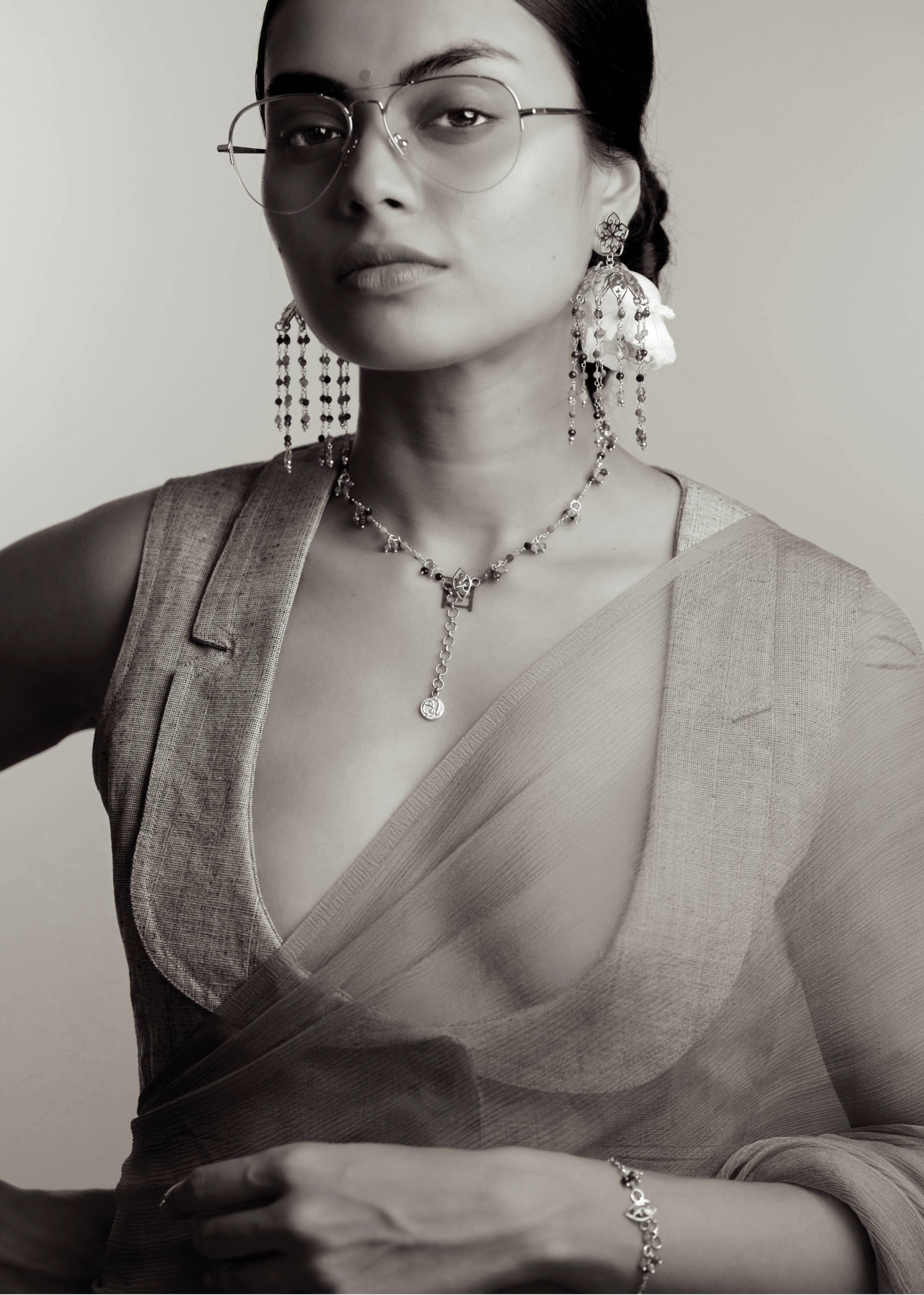 designer jhumka earrings by eina ahluwalia with multi coloured tourmalines for weddings and occasions