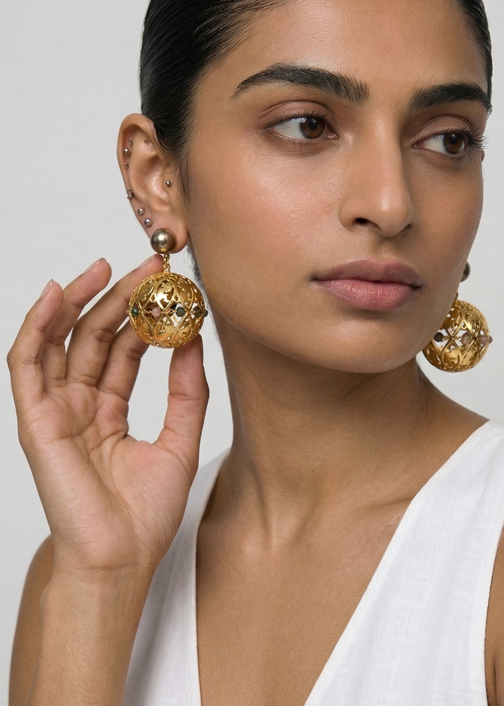 lightweight 3-dimensional ball earrings with a detachable, accented champagne pearl stud accented with 10 multi-coloured Tourmalines