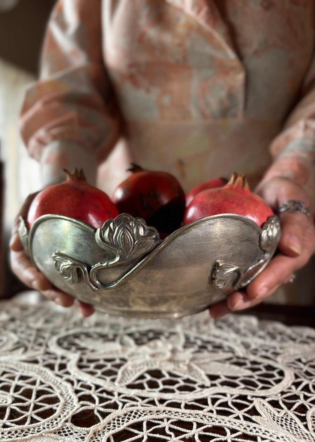 Beautiful silver-plated Art Nouveau bowl decorated with water lilies. The curvaceous floral and vine are cast and applied on the scalloped rim and sides of the bow and are classic art nouveau. This is a perfect fruit bowl or center piece. Made in France, early 1900s.