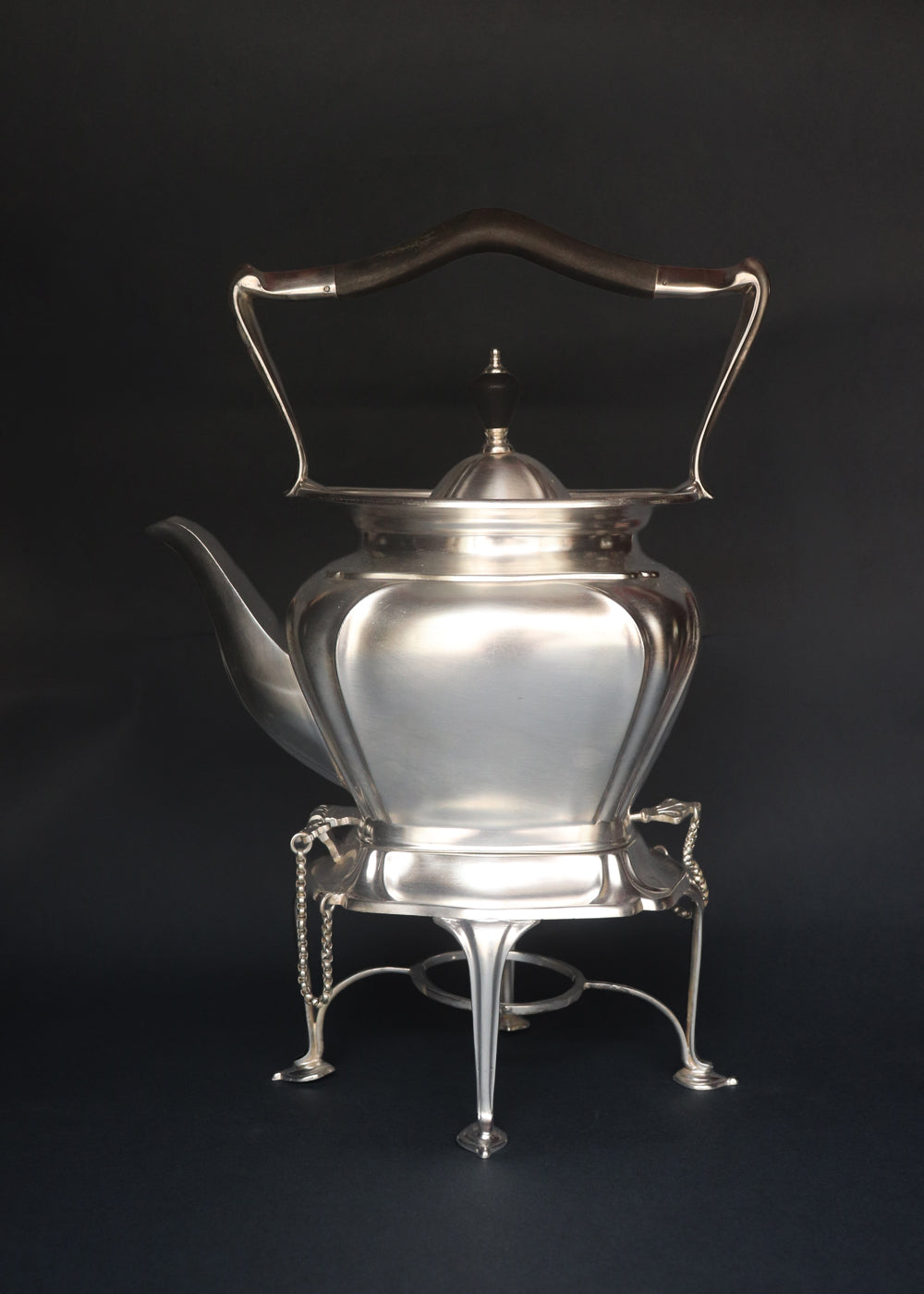 Antique Edwardian spirit kettle with its stand, burner and securing pins in superb condition. The kettle was made by Roberts &amp; Belk in Sheffield with high-grade silver plate or” Regent Plate”, and the base has all the authenticating stamps including the registration number which was was officially issued by the British patient office in the year 1902, confirming that this kettle was made in England between 1902 and 1910.