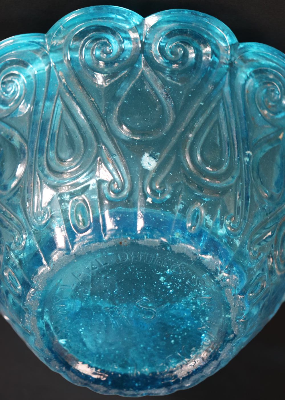 Antique moulded glass bowl in a beautiful turquoise colour and an incredible history