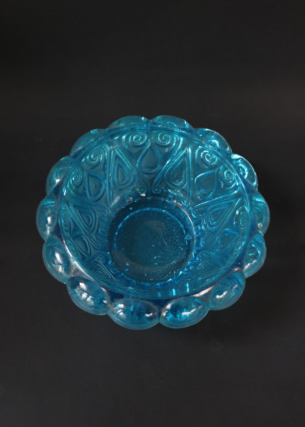 Antique moulded glass bowl in a beautiful turquoise colour and an incredible history