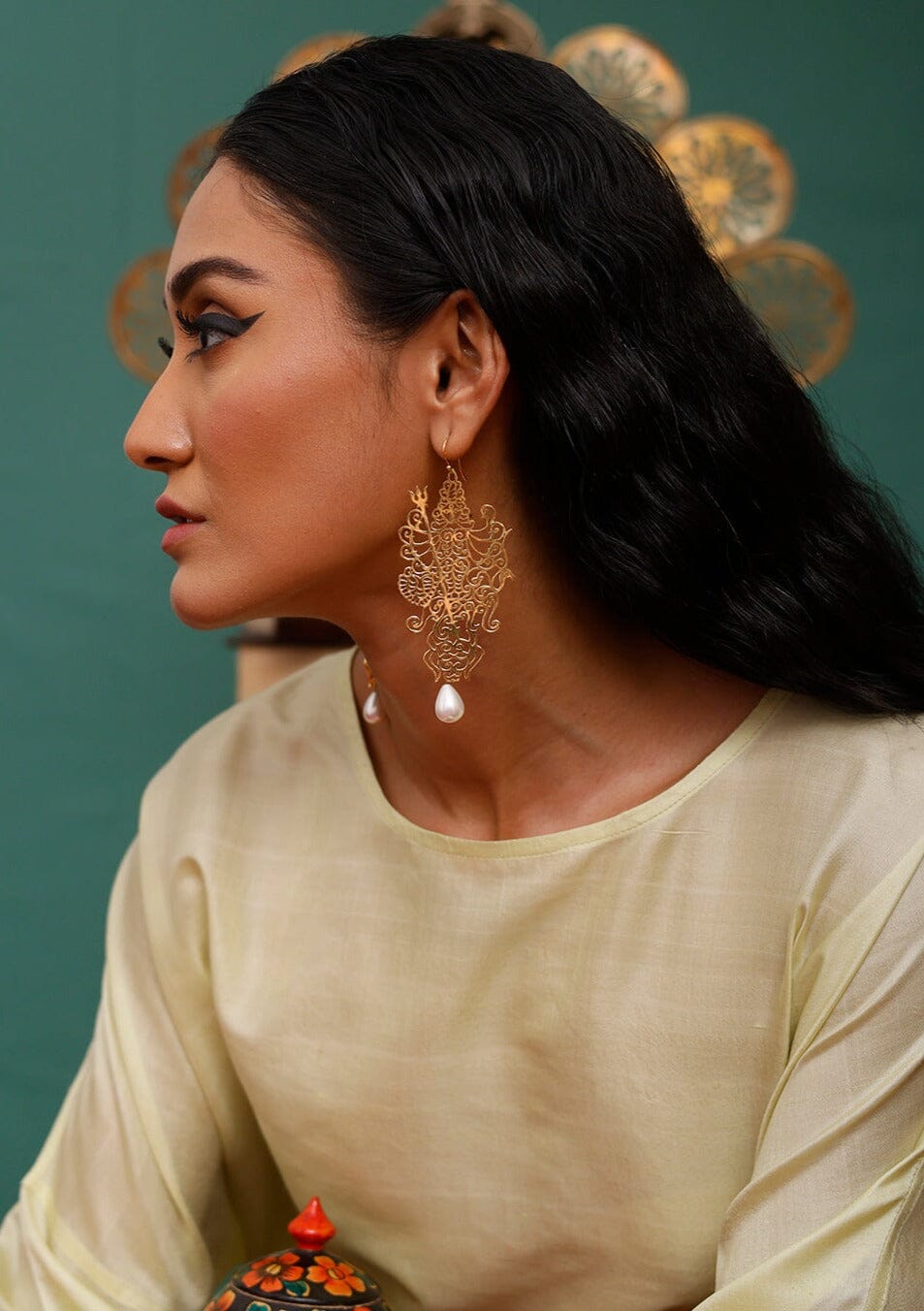 Durga Earrings handcrafted in gold plated brass