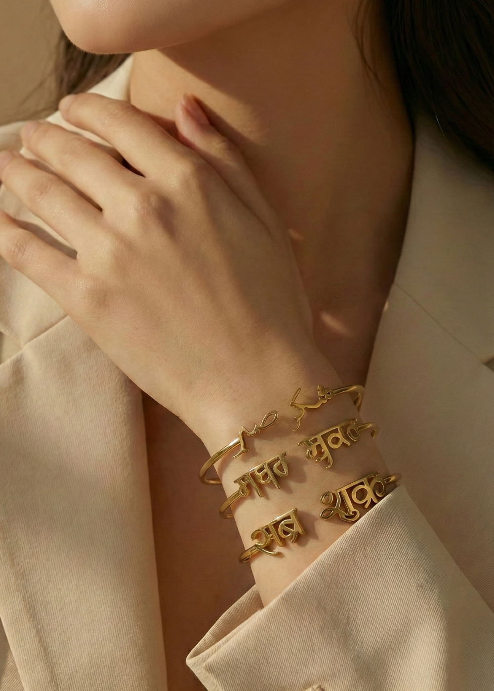 Sabr Shukr Bangle in Arabic, Gurmukhi and Devnagri in sterling silver and 18k gold by indian jewellery designer eina ahluwalia