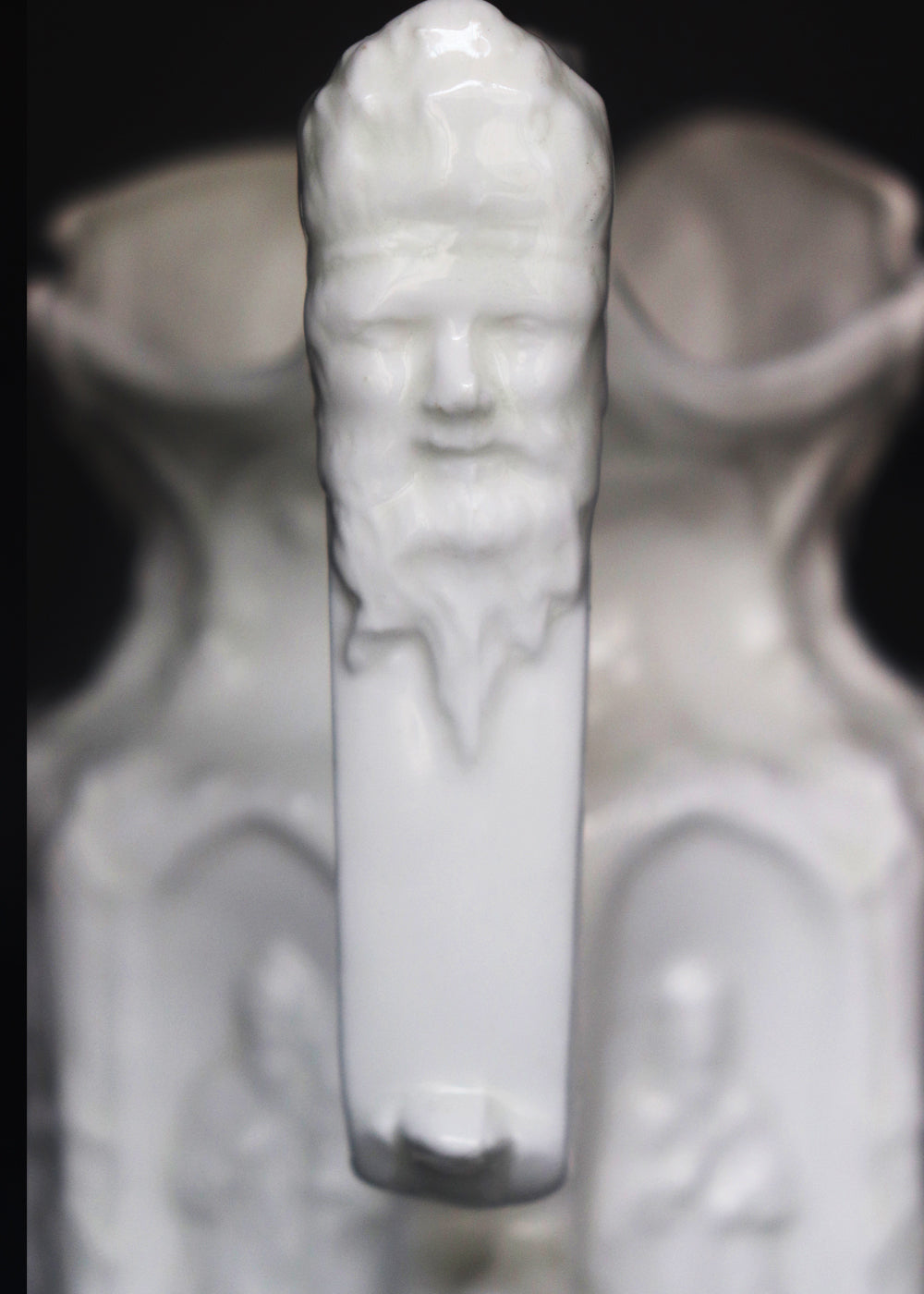 Vintage Apostle Jug featuring raised, molded figures of the apostles under Gothic-style architectural arches. This design was first made by Charles Meigh in 1842 in Staffordshire, and these pieces are displayed at the V&amp;A and the Metropolitan Museum. The arcaded "Gothic" decoration is a response by the pottery industry to the ideas of the influential architect and designer Augustus Charles Pugin (1762–1832). The design was so popular that several companies continued making them more than a 100 years aft