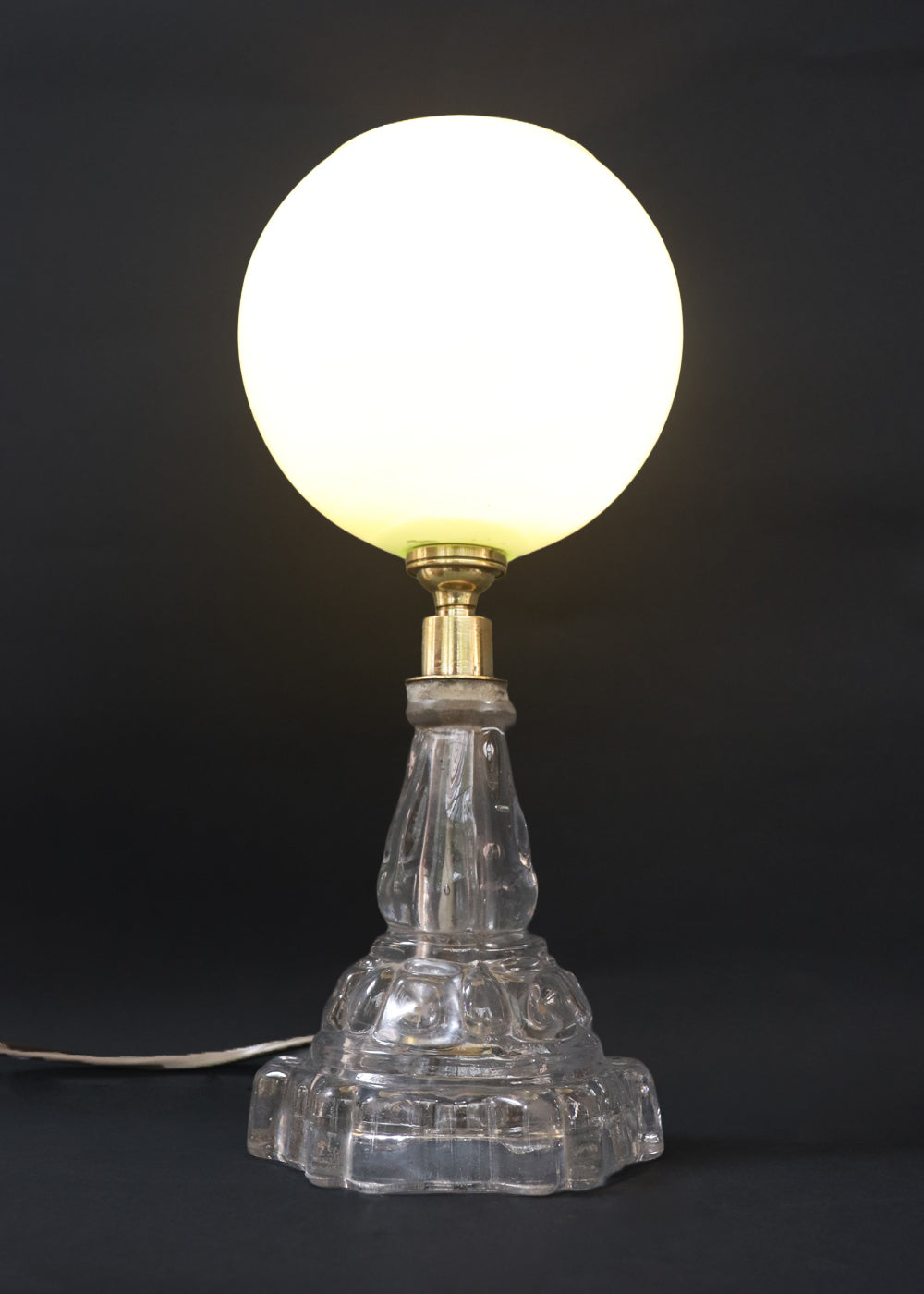 Vintage Art Deco table lamp with a clear moulded glass stepped base. The base and body are heavy pressed glass