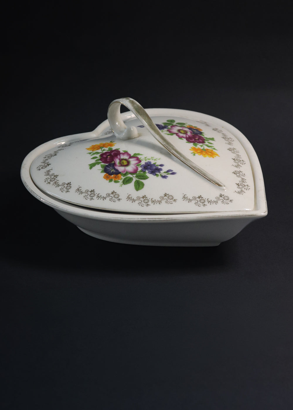 Vintage French Hors D'oeuvre set ornamented with beautiful floral bouquets and rimmed with gilted floral borders. These are by Hallimax, a French brand that distributed high-quality, romantic-style porcelain.