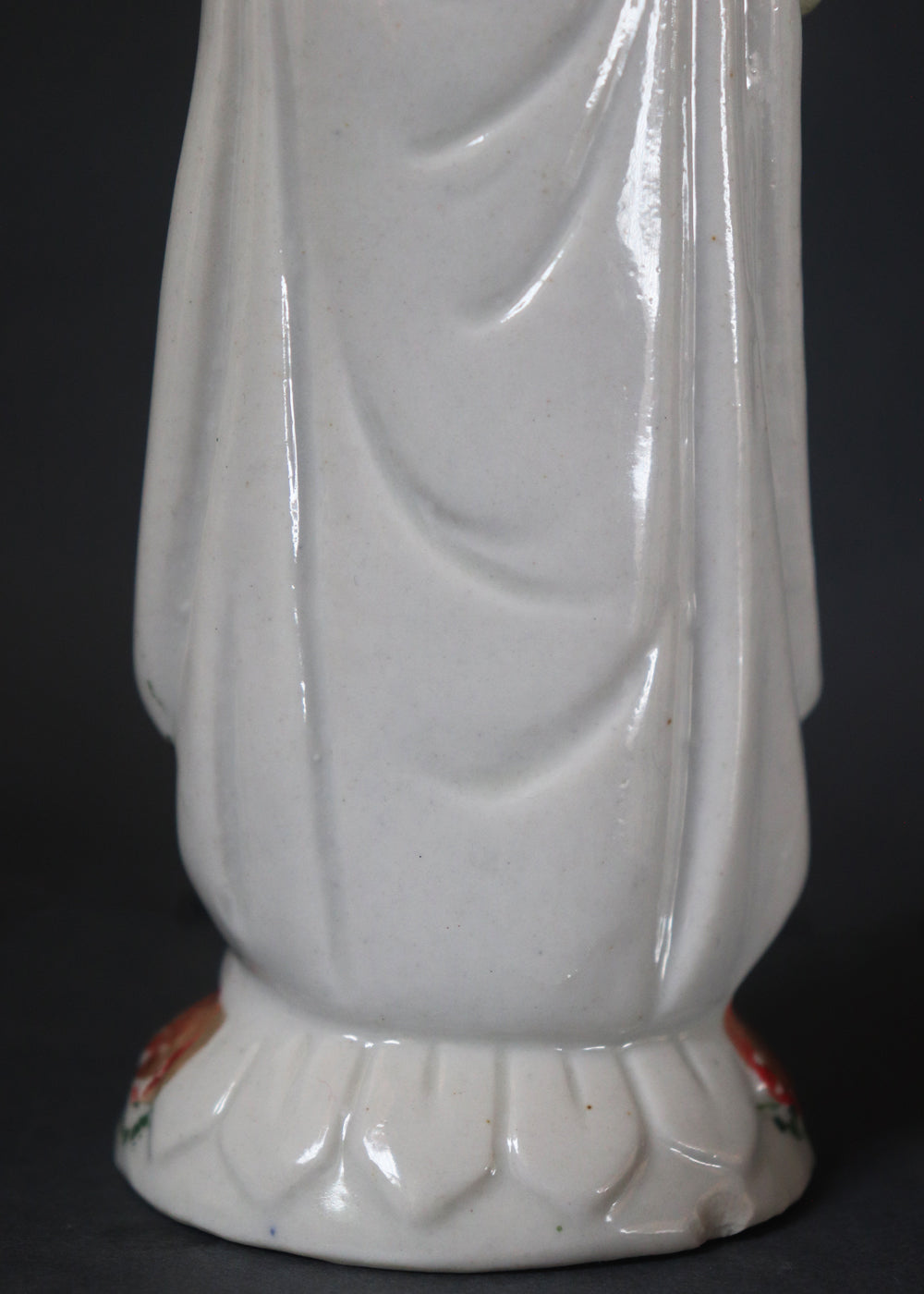 German made porcelain slip cast figure of Lord Krishna made for colonial India in the early 1900s. These figures were inspired by paintings by Raja Ravi Varma.