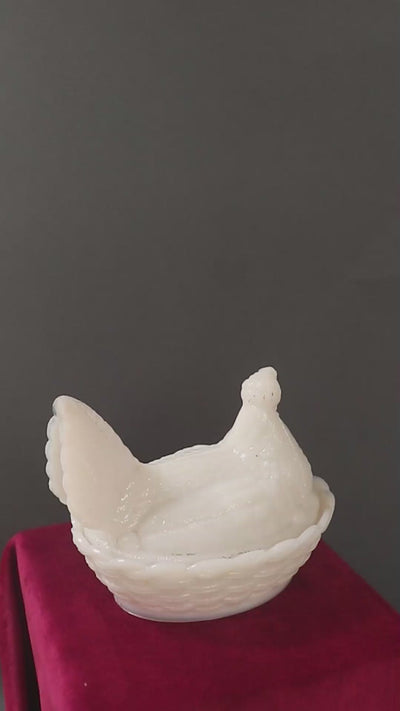 Antique opaline milk glass Hen on Nest covered dish. It was made by the prestigious French company Portieux Vallerysthal, and the company designed these between 1870 to 1920 so this piece is anywhere from 106 to 156 years old! The entire piece is very realistic with the feathers on the hen and the basket weave detail on nest, and the white colour is more rare than the others. Made in France.