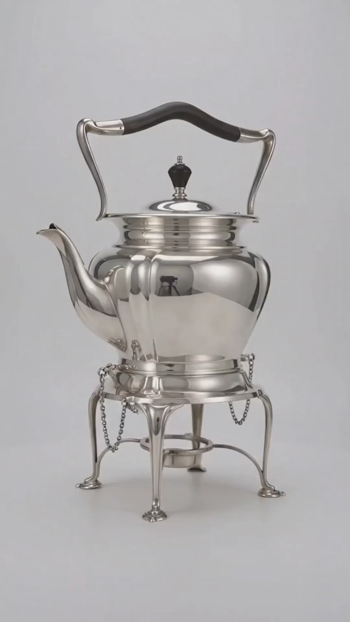 Antique Edwardian spirit kettle with its stand, burner and securing pins in superb condition. The kettle was made by Roberts &amp; Belk in Sheffield with high-grade silver plate or” Regent Plate”, and the base has all the authenticating stamps including the registration number which was was officially issued by the British patient office in the year 1902, confirming that this kettle was made in England between 1902 and 1910.