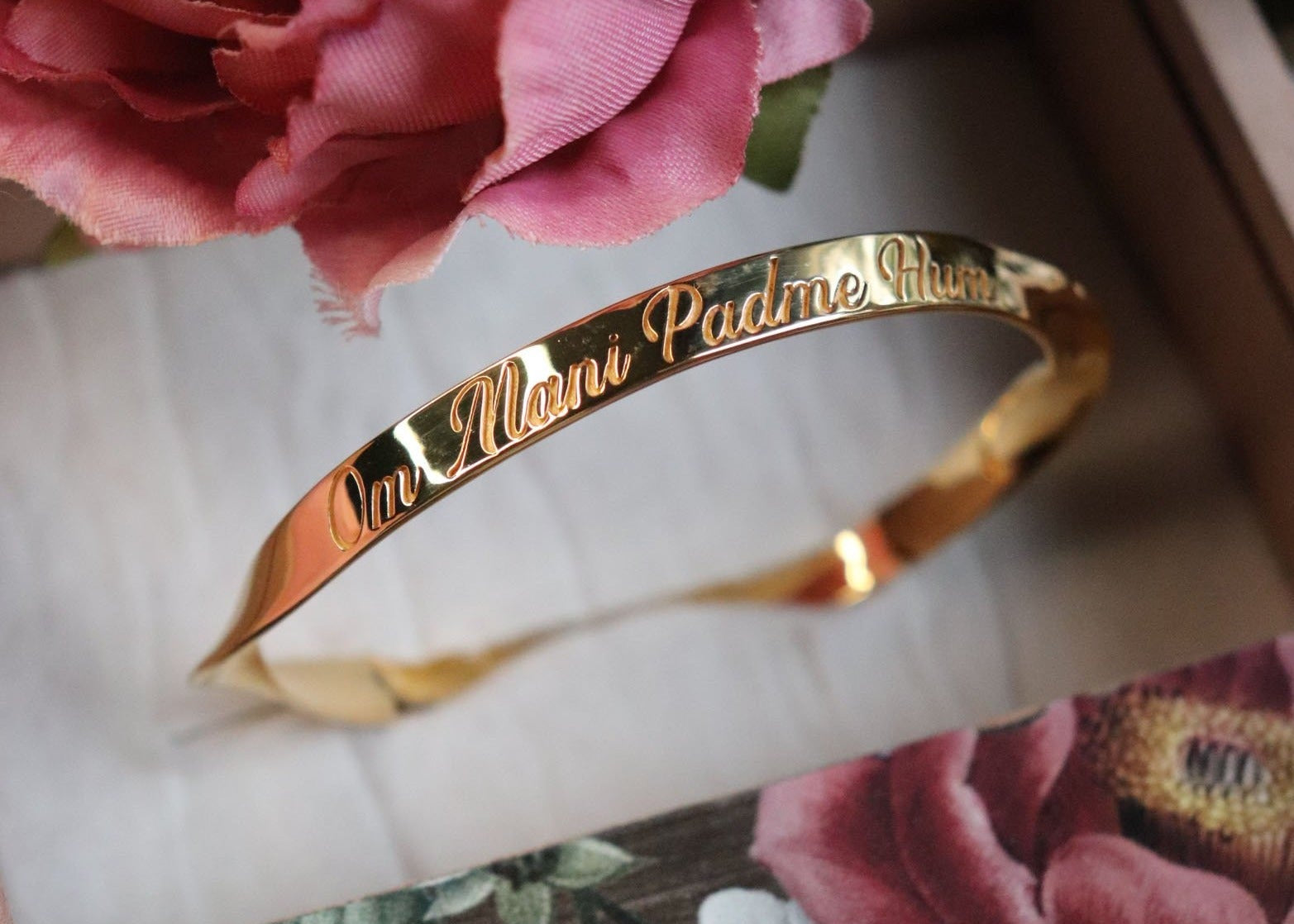 Custom Engraved Om Mani Padme Hum Name Word Mantra Bangle in sterling silver and 18k gold by Indian Designer Jewellery Artist Eina Ahluwalia