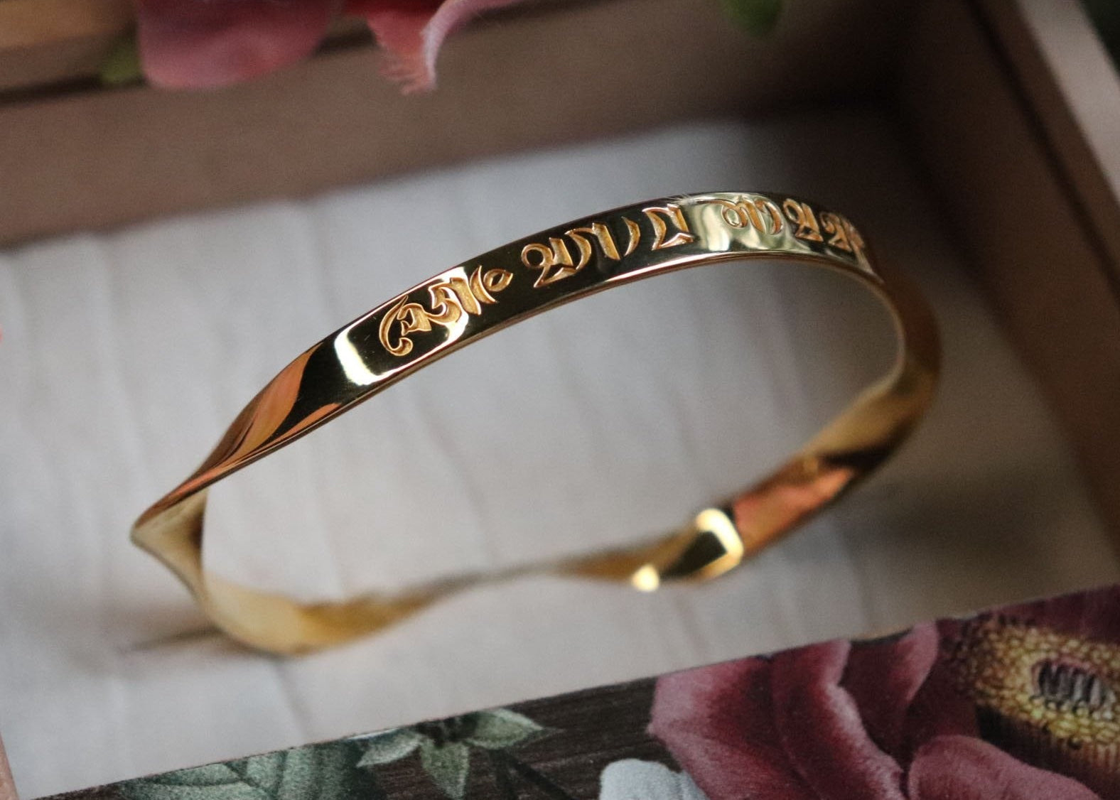 Custom Engraved Om Mani Padme Hum Name Word Mantra Bangle in sterling silver and 18k gold by Indian Designer Jewellery Artist Eina Ahluwalia