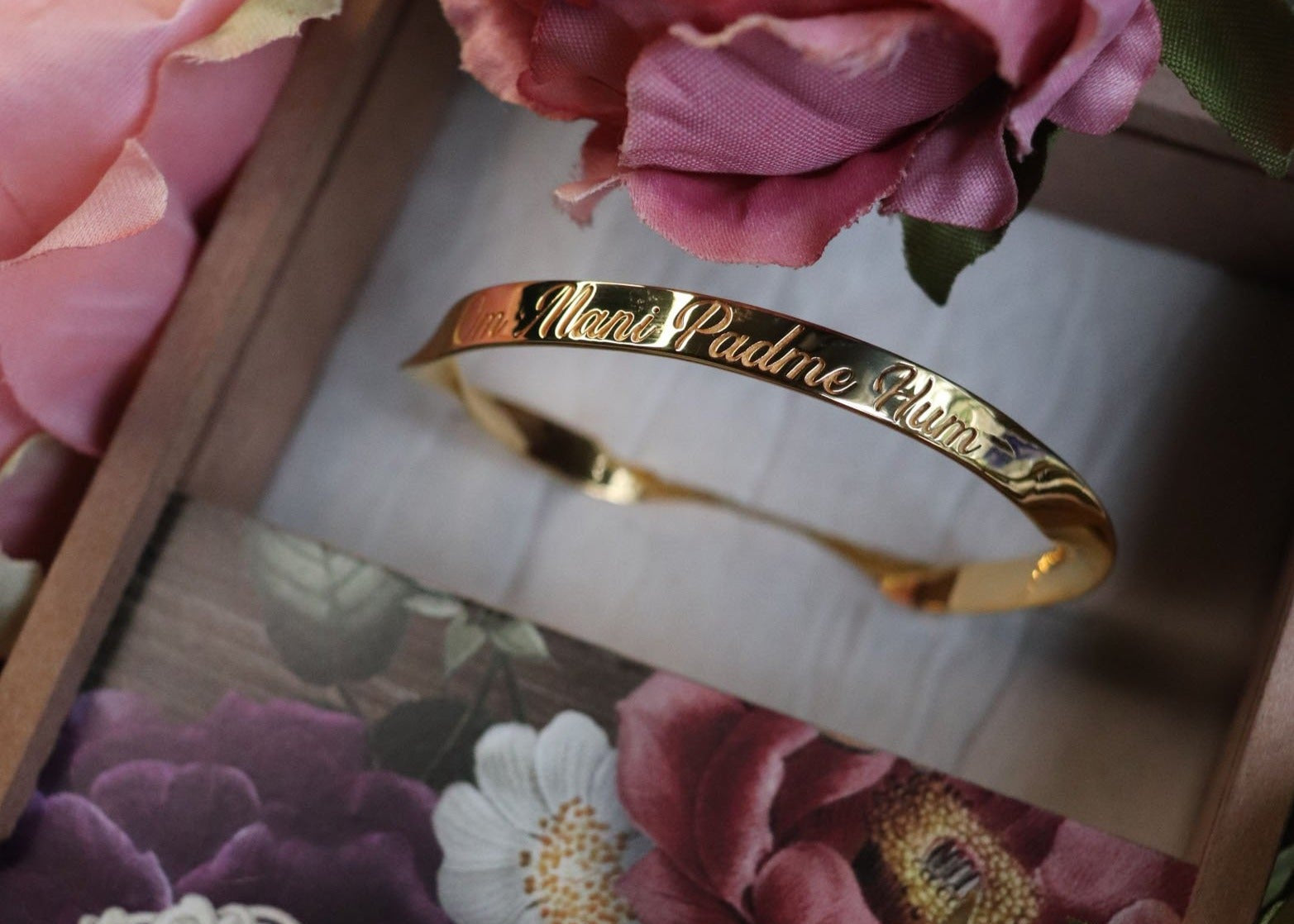 Custom Engraved Om Mani Padme Hum Name Word Mantra Bangle in sterling silver and 18k gold by Indian Designer Jewellery Artist Eina Ahluwalia