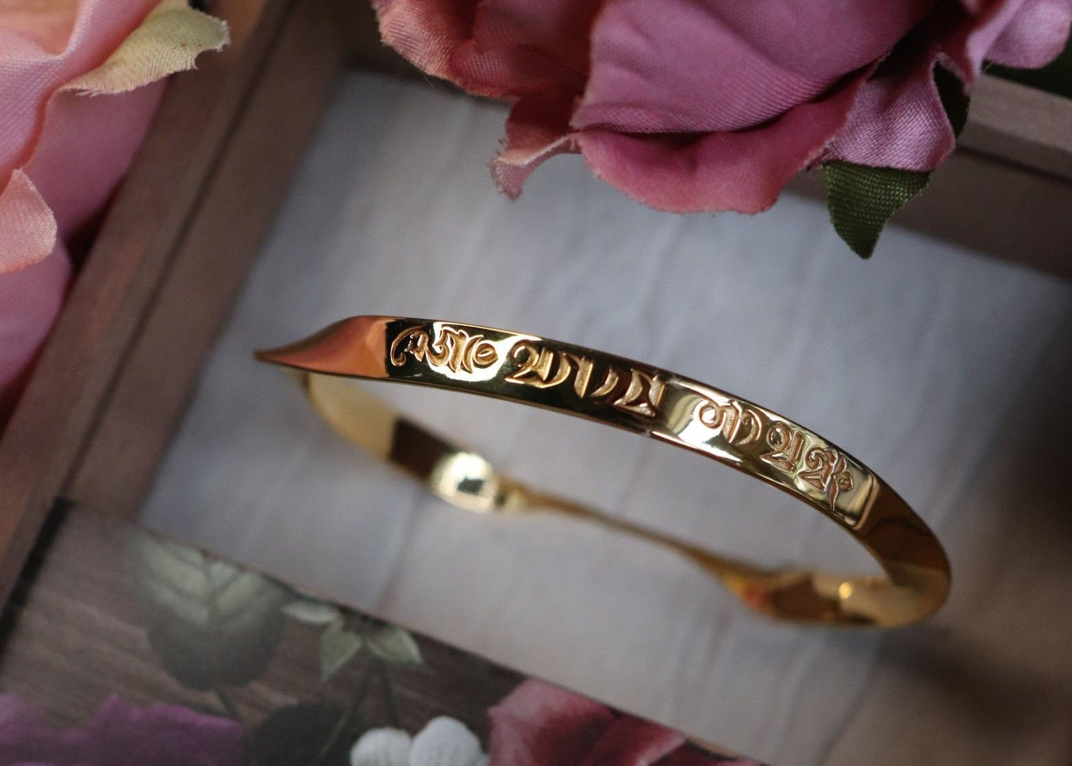 Custom Engraved Om Mani Padme Hum Name Word Mantra Bangle in sterling silver and 18k gold by Indian Designer Jewellery Artist Eina Ahluwalia