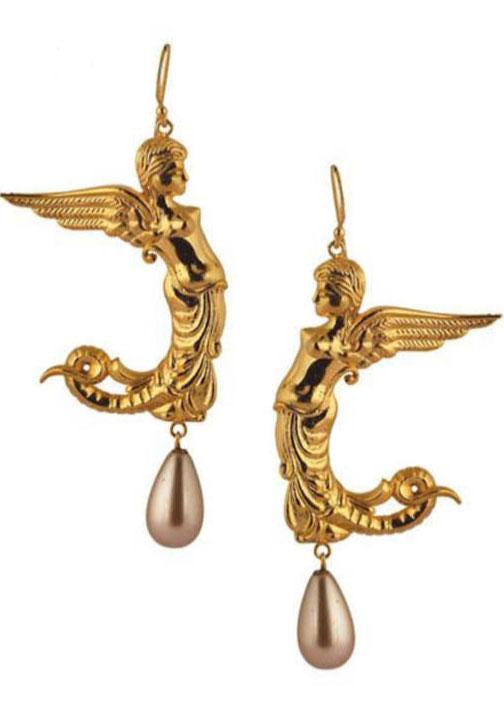 A pair of gold-tone dangling earrings featuring a winged female figure with a mermaid-like tail and a teardrop pearl drop, shown on a plain white background.