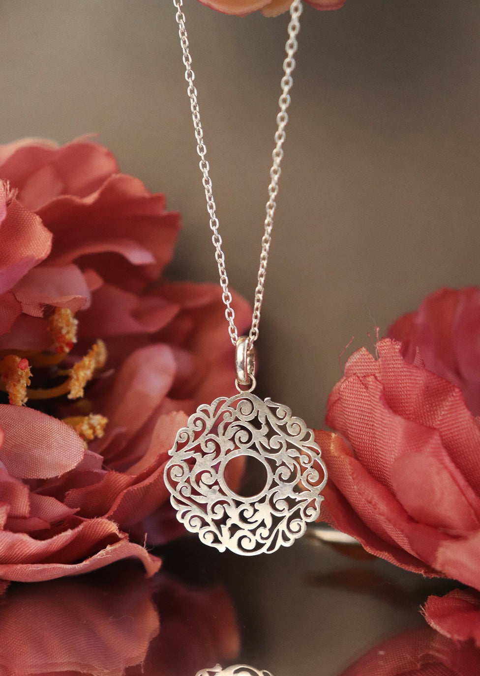 Sudarshan chakra fretwork medallion pendant in sterling silver